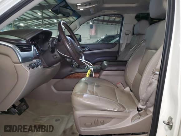 2015 Chevrolet Tahoe LTZ с VIN 1GNSKCKC8FR119003, выставлен на аукционе Copart как лот 85568875 с пробегом 168 240 миль миль и На запчасти • Non repairable. История ставок и продаж доступна на DreamBid. Изображение 7.
