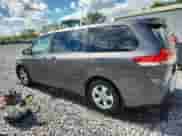 2012 Toyota Sienna with VIN 5TDZK3DCXCS233781, listed as a Copart auction lot 82167325 with 183,332 mi miles and Salvage title. Bid and sale history available at DreamBid. Image 2.