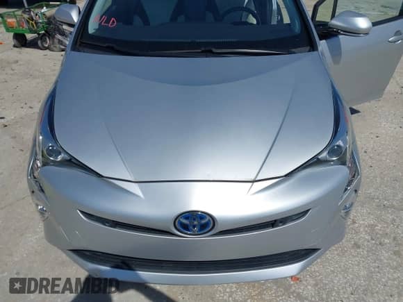 2017 Toyota Prius Two z VIN JTDKARFU7H3047752, wystawiony jako IAAI lot #41706089 z przebiegiem 45 391 mil mil oraz . Historia ofert i sprzedaży dostępna na DreamBid. Obrazek 6.