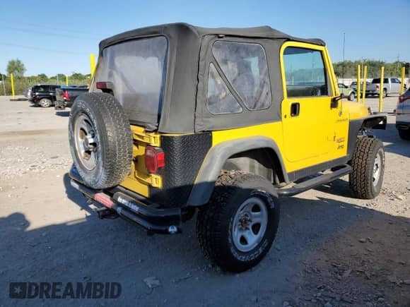 2000 Jeep Wrangler SE with VIN 1J4FA29P3YP705536, listed as a Copart auction lot 70344835 with 97,028 mi miles and Clean title. Bid and sale history available at DreamBid. Image 3.