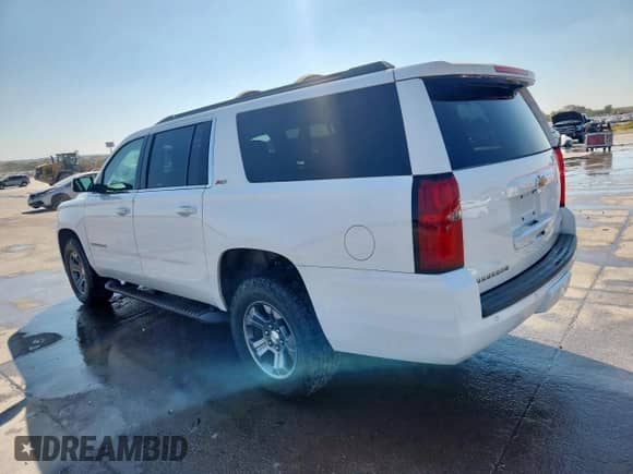 2016 Chevrolet Suburban LT с VIN 1GNSKHKC3GR424228, выставлен на аукционе Copart как лот 84026475 с пробегом 98 603 миль миль и Списание • Salvage title. История ставок и продаж доступна на DreamBid. Изображение 2.