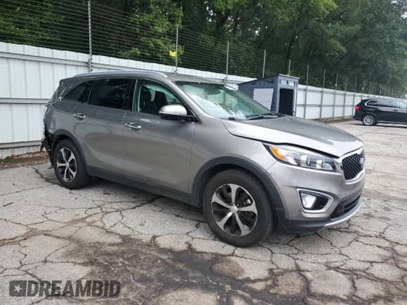 2018 Kia Sorento EX with VIN 5XYPH4A59JG385384, listed as a Copart auction lot 66853495 with 197,261 mi miles and Salvage title. Bid and sale history available at DreamBid. Image 4.