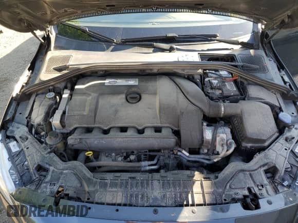2014 Volvo S60 T6 with VIN YV1902FHXE1293885, listed as a Copart auction lot 61904664 with 105,151 mi miles and Salvage title. Bid and sale history available at DreamBid. Image 11.
