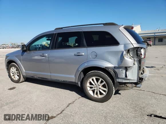 2017 Dodge Journey SXT with VIN 3C4PDCBG9HT572469, listed as a Copart auction lot 81464005 with 77,095 mi miles and Salvage title. Bid and sale history available at DreamBid. Image 2.