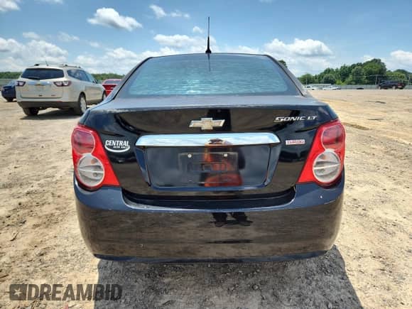 2012 Chevrolet Sonic LT z VIN 1G1JD5SB6C4109315, wystawiony jako Copart lot #61291025 z przebiegiem 143 603 mil mil oraz Czysty tytuł • Clean title. Historia ofert i sprzedaży dostępna na DreamBid. Obrazek 6.