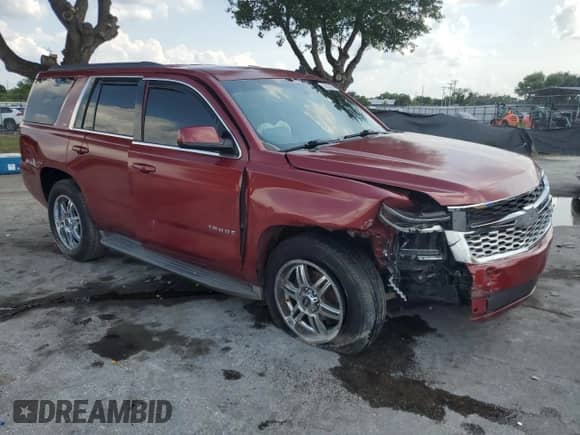 2015 Chevrolet Tahoe LS с VIN 1GNSCAKC0FR304020, выставлен на аукционе Copart как лот 56285505 с пробегом 186 105 миль миль и Списание • Salvage title. История ставок и продаж доступна на DreamBid. Изображение 4.