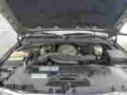 2003 Chevrolet Suburban LT z VIN 3GNEC16Z13G215015, wystawiony jako Copart lot #71533544 z przebiegiem 430 252 mil mil oraz Szkoda całkowita • Salvage title. Historia ofert i sprzedaży dostępna na DreamBid. Obrazek 13.