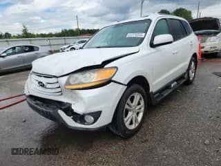 2011 Hyundai Santa Fe SE with VIN 5XYZH4AG2BG043030, listed as a Copart auction lot 64979255 with 157,696 mi miles and Salvage title. Bid and sale history available at DreamBid. Image 1.