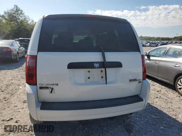 2010 Dodge Grand Caravan SE with VIN 2D4RN4DE0AR120557, listed as a Copart auction lot 70667235 with 184,516 mi miles and Salvage title. Bid and sale history available at DreamBid. Image 6.