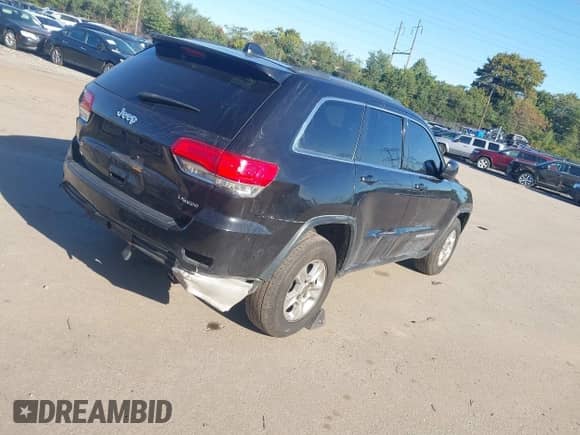 2014 Jeep Grand Cherokee Laredo z VIN 1C4RJFAG2EC392312, wystawiony jako IAAI lot #43394833 z przebiegiem 135 882 mil mil oraz . Historia ofert i sprzedaży dostępna na DreamBid. Obrazek 4.