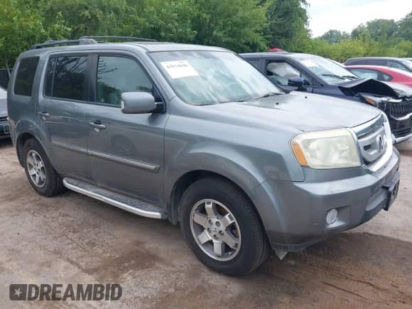 2009 Honda Pilot Touring with VIN 5FNYF48969B031280, listed as a IAAI auction lot 42934690 with 163,844 mi miles and . Bid and sale history available at DreamBid. Image 1.