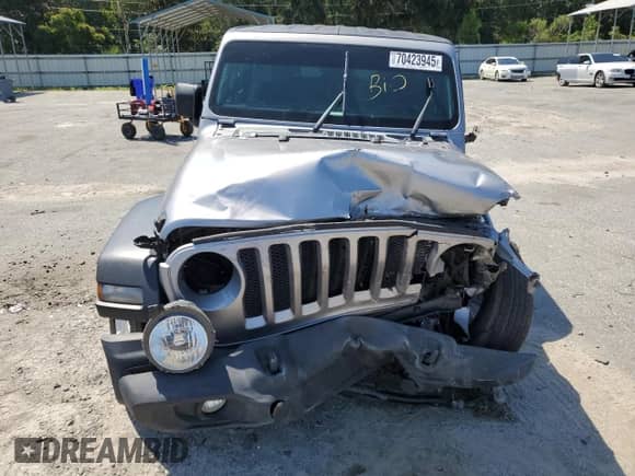 2020 Jeep Wrangler Sport S with VIN 1C4GJXAG8LW215563, listed as a Copart auction lot 70423945 with 69,559 mi miles and Salvage title. Bid and sale history available at DreamBid. Image 5.