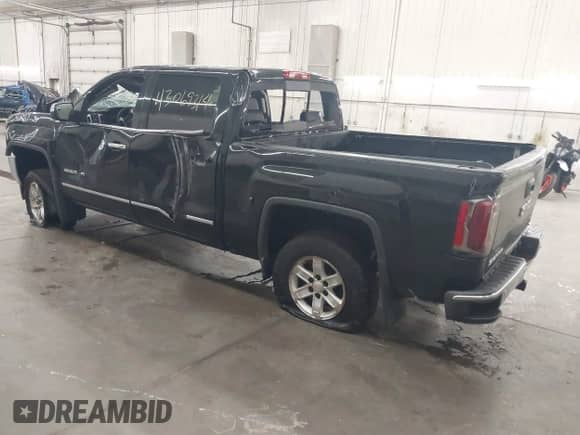 2017 GMC Sierra 1500 SLT with VIN 3GTU2NEC6HG102079, listed as a IAAI auction lot 43069314 with Not provided miles and . Bid and sale history available at DreamBid. Image 3.