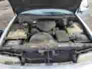 1994 Chevrolet Caprice LS z VIN 1G1BN52PXRR110752, wystawiony jako Copart lot #52323495 z przebiegiem 234 402 mil mil oraz Szkoda całkowita • Salvage title. Historia ofert i sprzedaży dostępna na DreamBid. Obrazek 11.