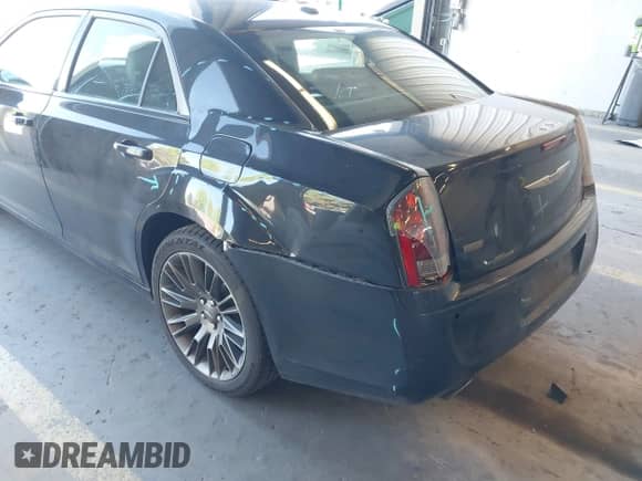 2013 Chrysler 300 C John Varvatos Limited Edition with VIN 2C3CCADT1DH687848, listed as a IAAI auction lot 42175137 with 112,122 mi miles and . Bid and sale history available at DreamBid. Image 6.