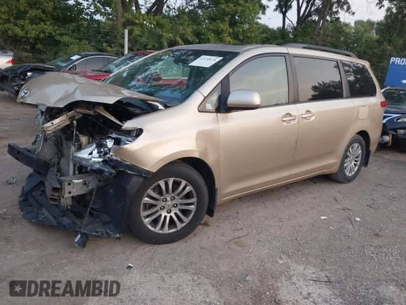 2011 Toyota Sienna XLE AAS with VIN 5TDYK3DC2BS045525, listed as a IAAI auction lot 43158126 with 151,128 mi miles and . Bid and sale history available at DreamBid. Image 2.
