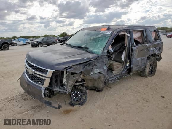 2016 Chevrolet Tahoe LT z VIN 1GNSCBKC8GR283523, wystawiony jako Copart lot #82261185 z przebiegiem Nie podano mil oraz Szkoda całkowita • Salvage title. Historia ofert i sprzedaży dostępna na DreamBid. Obrazek 1.