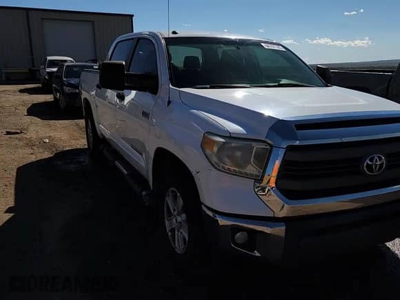 2014 Toyota Tundra SR5 z VIN 5TFDW5F1XEX349467, wystawiony jako Copart lot #84767785 z przebiegiem 250 058 mil mil oraz Szkoda całkowita • Salvage title. Historia ofert i sprzedaży dostępna na DreamBid. Obrazek 13.
