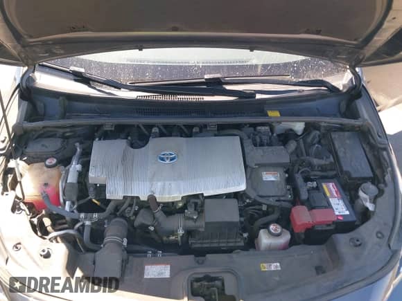 2018 Toyota Prius Plus z VIN JTDKARFP3J3073801, wystawiony jako IAAI lot #42903373 z przebiegiem 90 429 mil mil oraz . Historia ofert i sprzedaży dostępna na DreamBid. Obrazek 10.