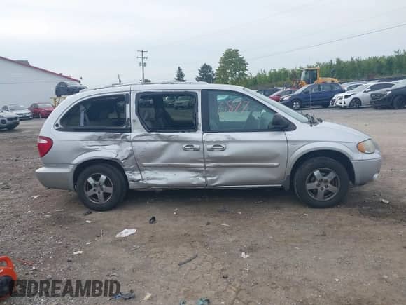 2004 Dodge Caravan SXT with VIN 2D4GP44L64R516111, listed as a IAAI auction lot 43330877 with 128,284 mi miles and . Bid and sale history available at DreamBid. Image 13.