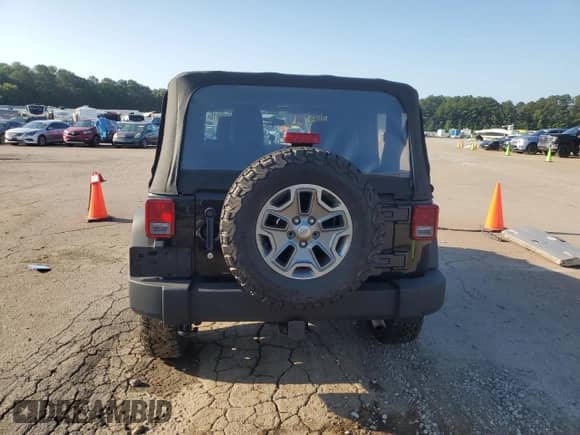 2013 Jeep Wrangler Sport with VIN 1C4AJWAG7DL655003, listed as a Copart auction lot 61839615 with 66,539 mi miles and Salvage title. Bid and sale history available at DreamBid. Image 6.