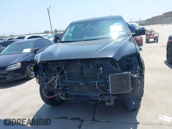 2022 Toyota Tundra SR with VIN 5TFKB5AB7NX017988, listed as a IAAI auction lot 42986871 with 50,437 mi miles and . Bid and sale history available at DreamBid. Image 12.