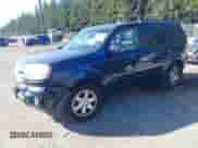 2009 Honda Pilot Touring with VIN 5FNYF489X9B007452, listed as a IAAI auction lot 43262557 with 206,355 mi miles and . Bid and sale history available at DreamBid. Image 2.