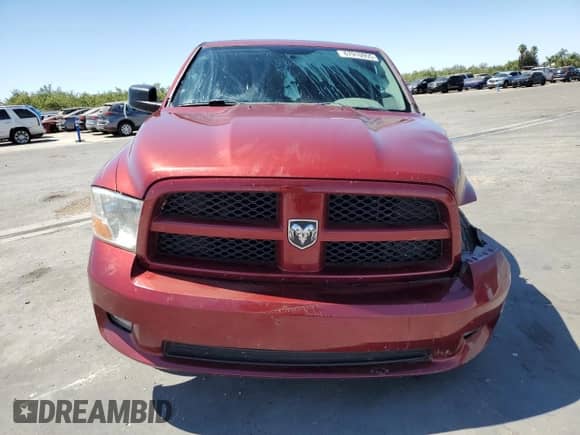 2012 Ram 1500 Express with VIN 3C6JD7AT3CG237468, listed as a Copart auction lot 67910955 with 523,897 mi miles and Salvage title. Bid and sale history available at DreamBid. Image 5.