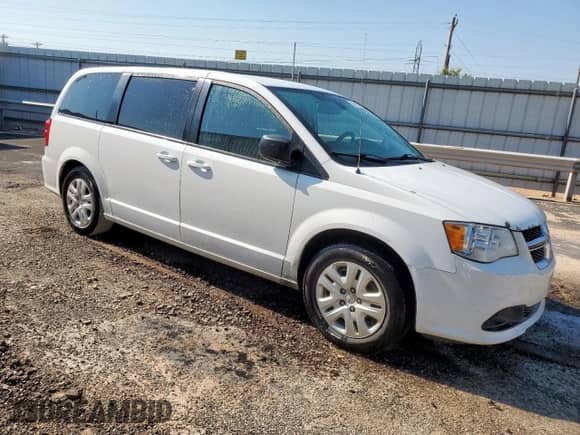 2018 Dodge Grand Caravan SE with VIN 2C4RDGBG0JR318559, listed as a Copart auction lot 67965755 with 312,674 mi miles and Clean title. Bid and sale history available at DreamBid. Image 4.
