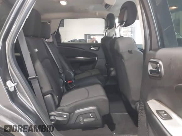 2015 Dodge Journey American Value with VIN 3C4PDCAB1FT744948, listed as a IAAI auction lot 42976982 with 77,765 mi miles and . Bid and sale history available at DreamBid. Image 8.