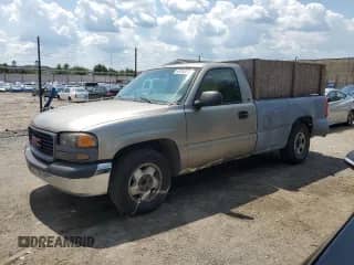 2001 GMC Sierra 1500 SL with VIN 1GTEC14W21Z187496, listed as a Copart auction lot 63243275 with 251,682 mi miles and Salvage title. Bid and sale history available at DreamBid. Image 1.