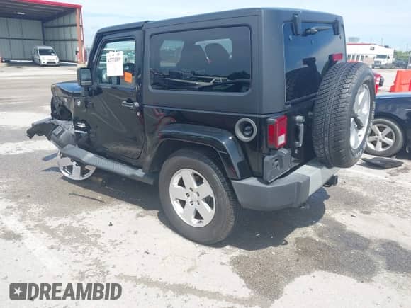2012 Jeep Wrangler Arctic with VIN 1C4AJWBG3CL157541, listed as a IAAI auction lot 42771309 with 116,489 mi miles and . Bid and sale history available at DreamBid. Image 3.