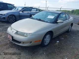 1999 Saturn SC with VIN 1G8ZY1277XZ229503, listed as a IAAI auction lot 42435302 with 217,039 mi miles and . Bid and sale history available at DreamBid. Image 2.