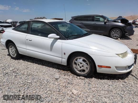 1997 Saturn SC с VIN 1G8ZG1273VZ138180, выставлен на аукционе Copart как лот 63857415 с пробегом 122 513 миль миль и Списание • Salvage title. История ставок и продаж доступна на DreamBid. Изображение 4.