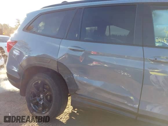 2022 Honda Pilot TrailSport with VIN 5FNYF6H88NB068019, listed as a IAAI auction lot 40857114 with 24,960 mi miles and . Bid and sale history available at DreamBid. Image 6.