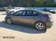 2014 Chevrolet Volt с VIN 1G1RA6E43EU132990, выставлен на аукционе Copart как лот 81311355 с пробегом 170 518 миль миль и Списание • Salvage title. История ставок и продаж доступна на DreamBid. Изображение 2.