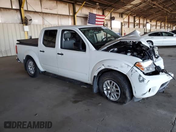 2020 Nissan Frontier SV with VIN 1N6ED0EA9LN720493, listed as a Copart auction lot 81438955 with 31,974 mi miles and Salvage title. Bid and sale history available at DreamBid. Image 4.