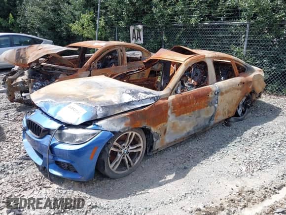 2015 BMW 4 Series 428i xDrive with VIN WBA4A7C50FD413176, listed as a IAAI auction lot 41851037 with Not provided miles and . Bid and sale history available at DreamBid. Image 2.