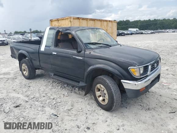 1997 Toyota Tacoma z VIN 4TAWN72N7VZ241873, wystawiony jako Copart lot #68393535 z przebiegiem 216 059 mil mil oraz Szkoda całkowita • Salvage title. Historia ofert i sprzedaży dostępna na DreamBid. Obrazek 4.