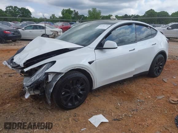 2022 Tesla Model Y Long Range z VIN 7SAYGDEE2NF385910, wystawiony jako IAAI lot #42146793 z przebiegiem 67 604 mil mil oraz . Historia ofert i sprzedaży dostępna na DreamBid. Obrazek 2.