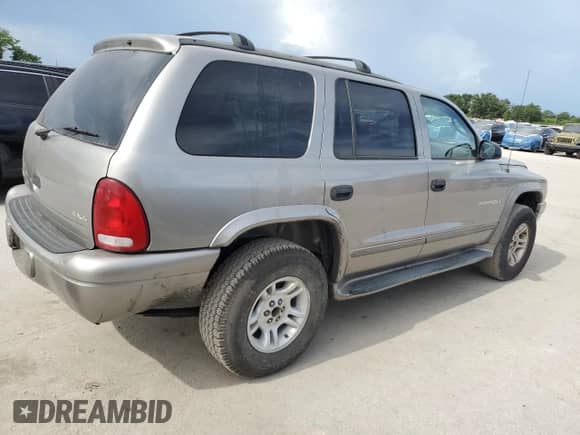 2001 Dodge Durango with VIN 1B4HS28N01F500549, listed as a Copart auction lot 65836855 with 73,486 mi miles and Clean title. Bid and sale history available at DreamBid. Image 3.