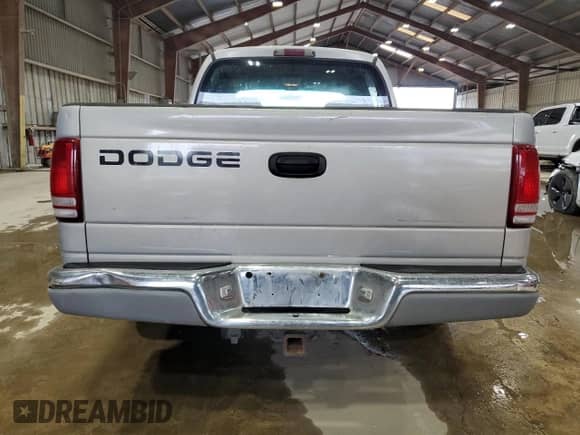 2000 Dodge Dakota Sport with VIN 1B7GL2AN1YS712433, listed as a Copart auction lot 61025395 with 211,801 mi miles and Salvage title. Bid and sale history available at DreamBid. Image 6.