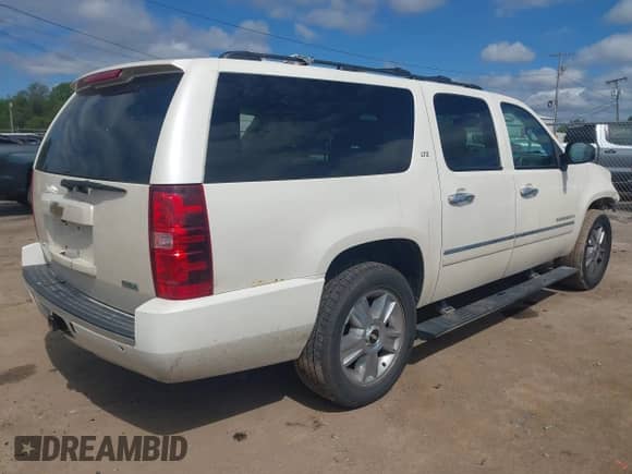 2010 Chevrolet Suburban LTZ with VIN 1GNUKKE36AR273474, listed as a IAAI auction lot 42331221 with 180,504 mi miles and . Bid and sale history available at DreamBid. Image 4.