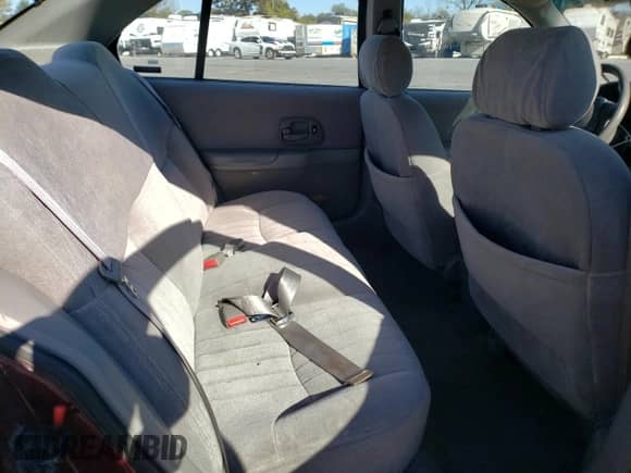 1996 Chevrolet Lumina z VIN 2G1WN52M8T1134491, wystawiony jako Copart lot #76111524 z przebiegiem 150 227 mil mil oraz Szkoda całkowita • Salvage title. Historia ofert i sprzedaży dostępna na DreamBid. Obrazek 10.