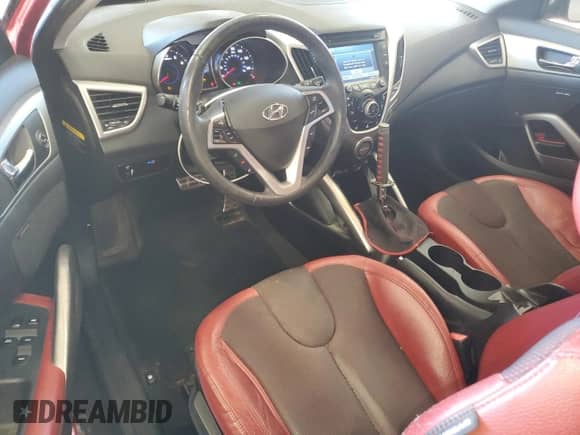 2012 Hyundai Veloster w/Red Int z VIN KMHTC6AD0CU027782, wystawiony jako Copart lot #81558205 z przebiegiem 104 484 mil mil oraz Szkoda całkowita • Salvage title. Historia ofert i sprzedaży dostępna na DreamBid. Obrazek 8.