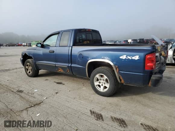 2007 Dodge Dakota SLT с VIN 1D7HW42PX7S138328, выставлен на аукционе Copart как лот 84390095 с пробегом 98 279 миль миль и Списание • Salvage title. История ставок и продаж доступна на DreamBid. Изображение 2.