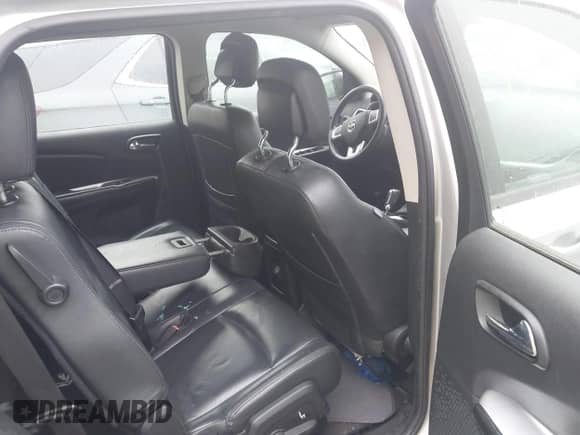 2014 Dodge Journey SE z VIN 3C4PDCAB2ET197221, wystawiony jako IAAI lot #43578095 z przebiegiem 164 446 mil mil oraz . Historia ofert i sprzedaży dostępna na DreamBid. Obrazek 8.