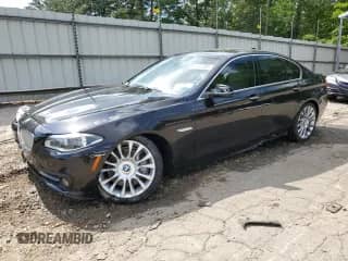 2016 BMW 5 Series 550i xDrive with VIN WBAKP9C58GD981050, listed as a Copart auction lot 54973955 with 40,559 mi miles and Salvage title. Bid and sale history available at DreamBid. Image 1.