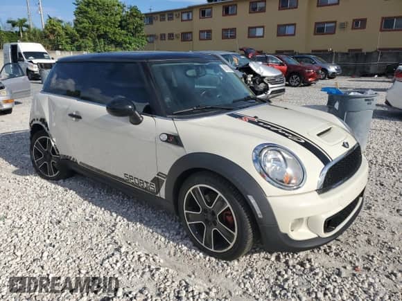 2011 MINI Hardtop S with VIN WMWSV3C51BTY23442, listed as a Copart auction lot 69919925 with Not provided miles and Salvage title. Bid and sale history available at DreamBid. Image 4.