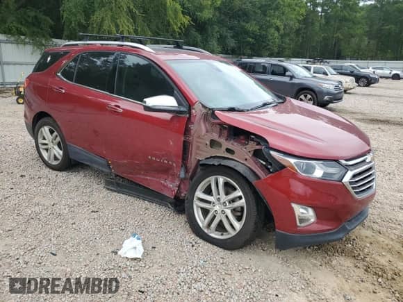 2018 Chevrolet Equinox Premier with VIN 2GNAXWEX3J6143212, listed as a Copart auction lot 69231285 with 119,947 mi miles and Salvage title. Bid and sale history available at DreamBid. Image 4.